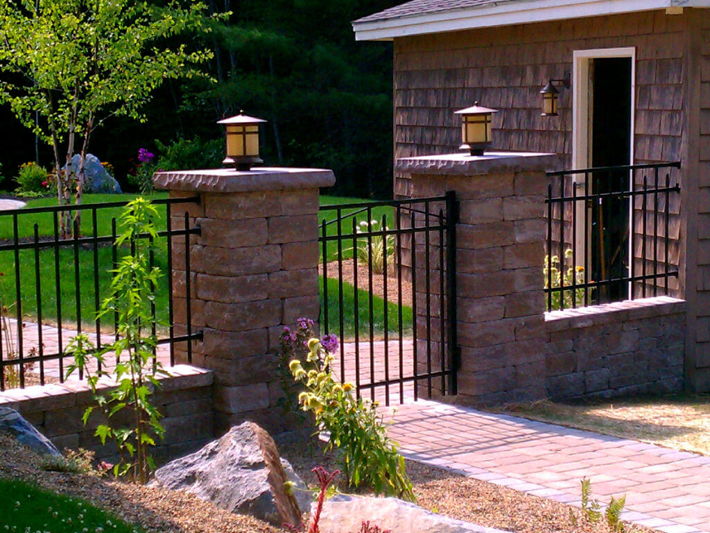 Residential ornamental metal fence with gate gate installation