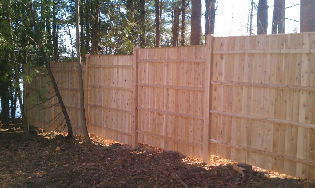 solid-cedar-privacy-fence-10-8-high-cedar-board-with-top-cap-and-5x5-beveled-top-post-stepped